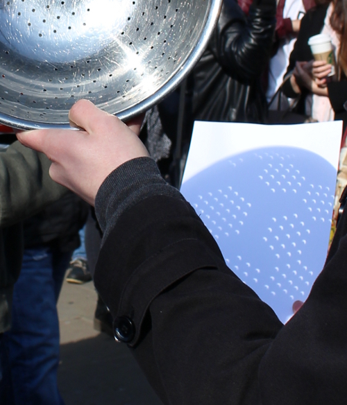 Using a colander as a pin hole camera. Image credit: Hannah Middleton