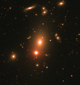 X-ray/radio/optical image of the poor cluster AWM 4, showing the jets of the central radio galaxy extending out into the hot, X-ray emitting plasma of the cluster halo.